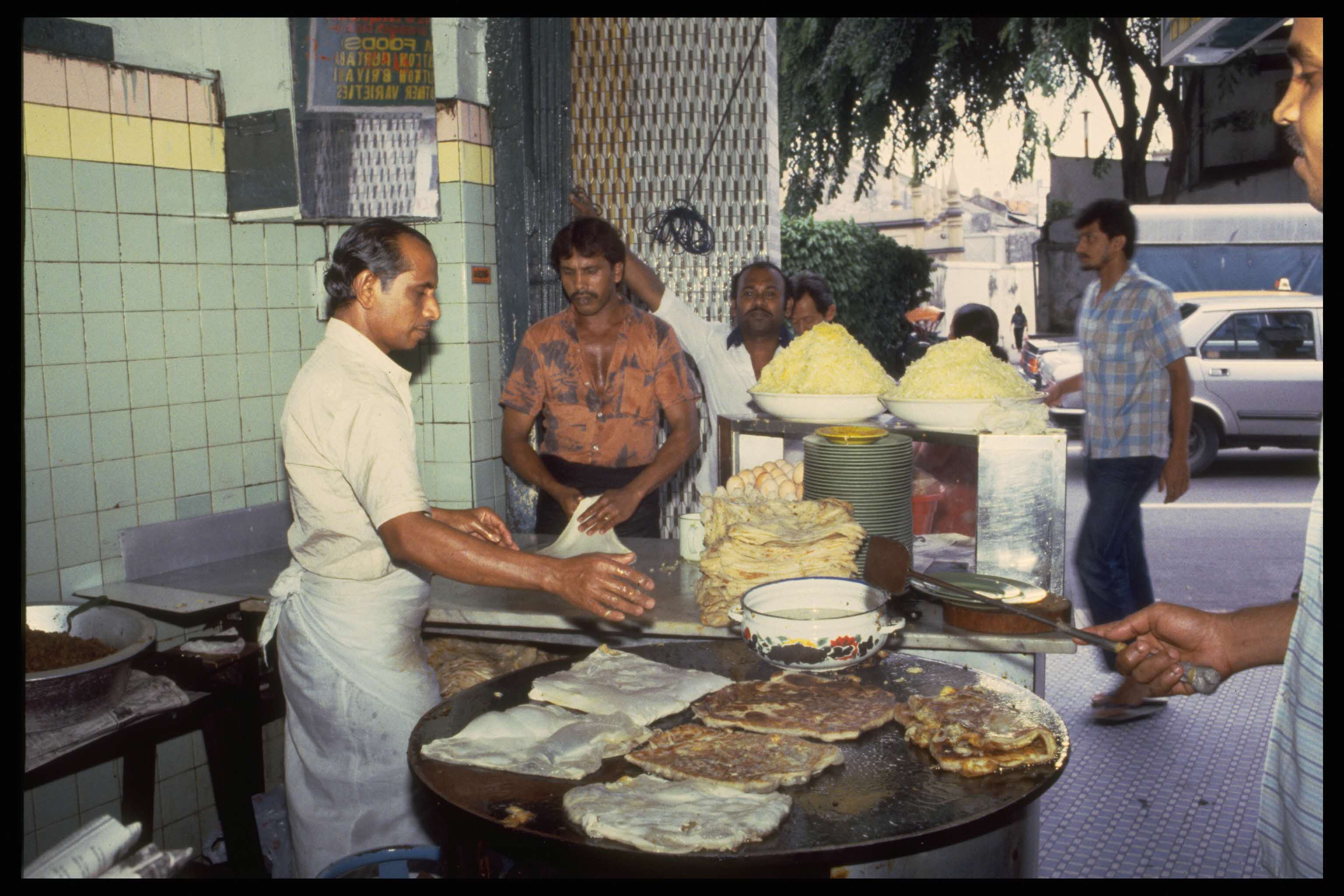 A man making murtabak along Arab Street, 1991
